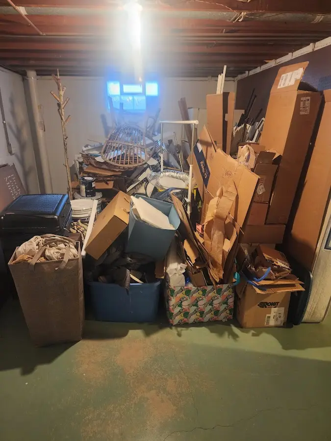 Roll-off dumpster container at job site for 2 Yard Dumpster Rental in Loris